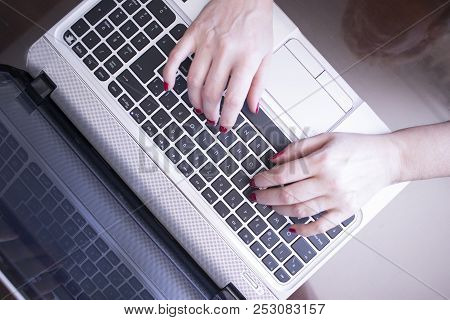 Woman Typing On Laptop Pc