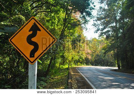 Road Sign On The Way Up To Mountain In Thailand Saying That The Road Is Twist