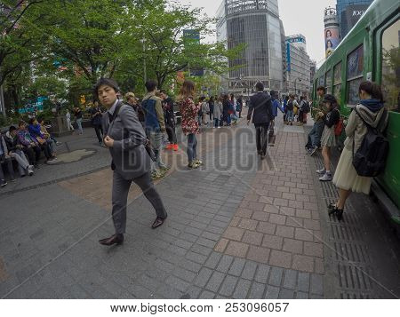 Tokyo, Japan - April 27, 2016: A Japanese Man Still Have To Go To Work Diligently While Others Are R
