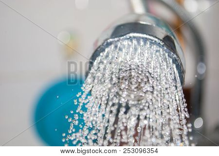 Close Up Water Flowing Out From Sink Shower In Kitchen