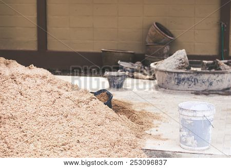 Construction Sand And Concrete Mixing Tub Is On The Floor Ready To Work On Repairing Old House