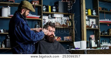 Hipster Client Getting Haircut. Barber With Hair Clipper Work On Hairstyle For Hipster, Barbershop B