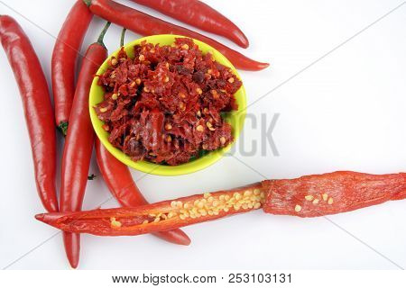 Red Chilly Chutney And Chilies On White Background. A Rural Food Item In India.