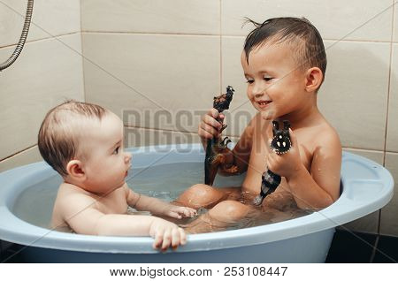 Children, Brother And Sister In The Bathroom