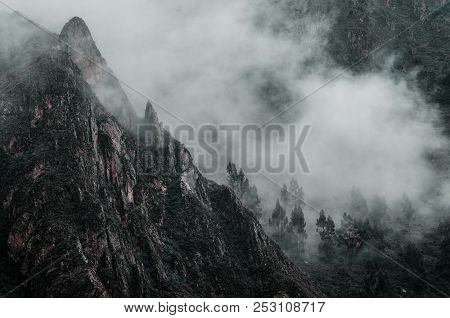 Mountains Can Be Seen From Behind The Clouds
