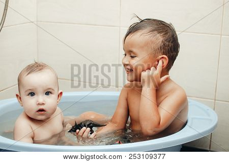 Children, Brother And Sister In The Bathroom
