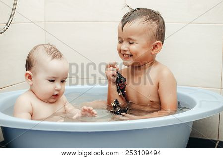 Children, Brother And Sister In The Bathroom