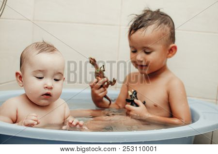 Children, Brother And Sister In The Bathroom