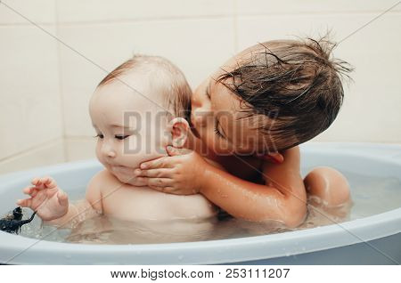 Children, Brother And Sister In The Bathroom