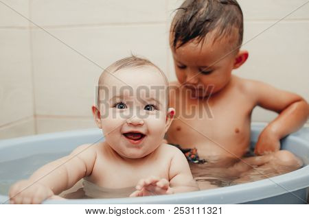 Children, Brother And Sister In The Bathroom