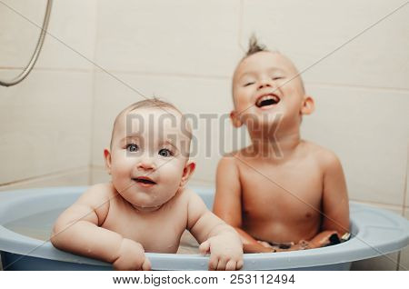 Children, Brother And Sister In The Bathroom