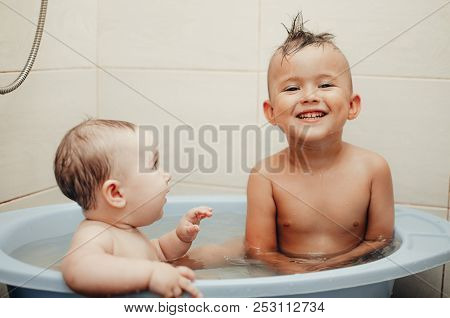 Children, Brother And Sister In The Bathroom