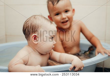 Children, Brother And Sister In The Bathroom