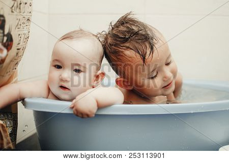 Children, Brother And Sister In The Bathroom