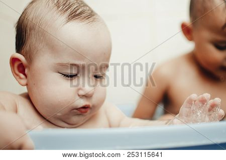 Children, Brother And Sister In The Bathroom