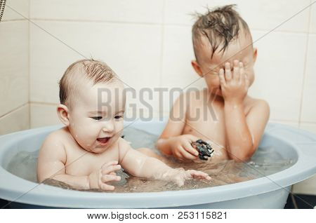 Children, Brother And Sister In The Bathroom