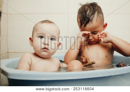 Children, Brother And Sister In The Bathroom