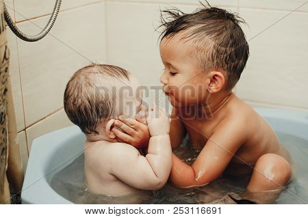 Children, Brother And Sister In The Bathroom