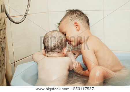 Children, Brother And Sister In The Bathroom
