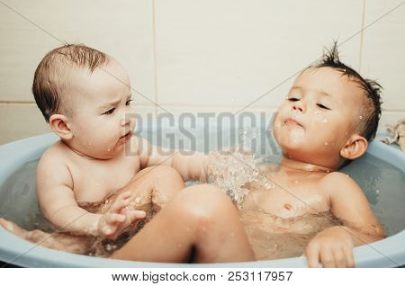 Children, Brother And Sister In The Bathroom