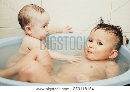 Children, Brother And Sister In The Bathroom