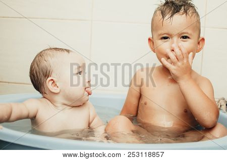 Children, Brother And Sister In The Bathroom
