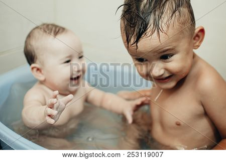 Children, Brother And Sister In The Bathroom