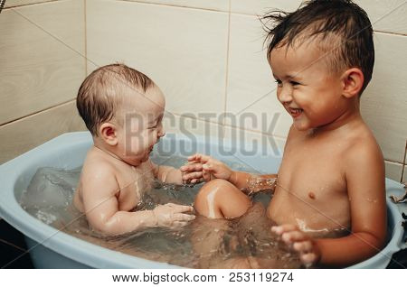 Children, Brother And Sister In The Bathroom