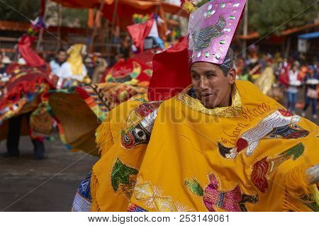 Oruro, Bolivia - February 25, 2017: Members Of A Waca Waca Dance Group In Ornate Costume Parade Thro