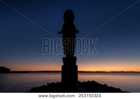 Totem Pole At Ambleside Park, West Vancouver, Just After Sunset.