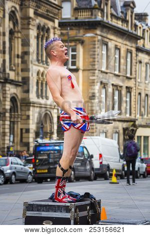 Edinburgh, Scotland  - August 7: Street Performer Spikey Will Standing On A Case At The Edinburgh Fr