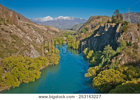 Shimmering Blue Water Of Kawarau River Near Queenstown, New Zealand
