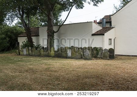 Beccles, Suffolk, Uk, July 2018 - Headstones Placed In A Corner Of Former Historic Kilbrack Cemetery