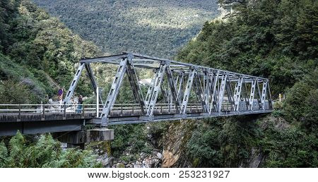 Haast, New Zealand - Apr 30, 2015. Old Metal Bridge At Thunder Creek Trail In Haast, New Zealand.