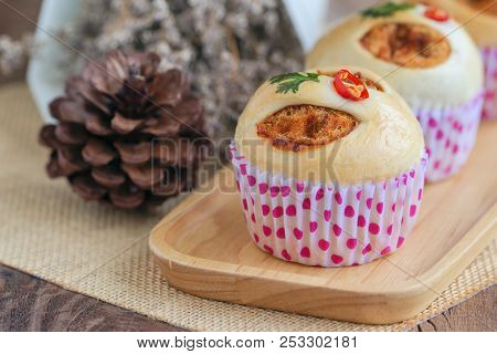 Homemade Soft And Sticky Bun Filled With Dried Shredded Pork On Wood Plate. Soft White Bread With Po