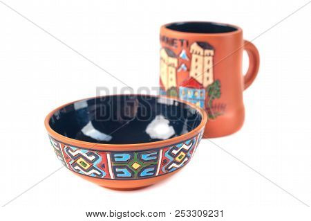 Georgian Clay Pottery With Tradicional Ornaments On It. White Background