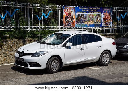 Novorossiysk, Russia - August 06, 2018: Parked Car On The Roadside Of The City Road Renault Fluence