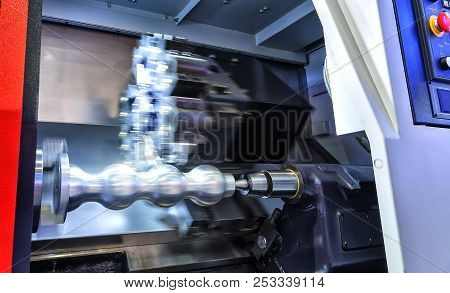 The Cnc Lathe Machine Or Turning Machine Drilling The Metal Rod With The Drill Tool And Center Drill