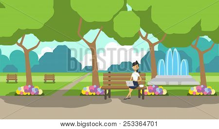 City Park Businesswoman Holding Laptopn Sitting Wooden Bench Green Lawn Flowers Fountain Trees Citys