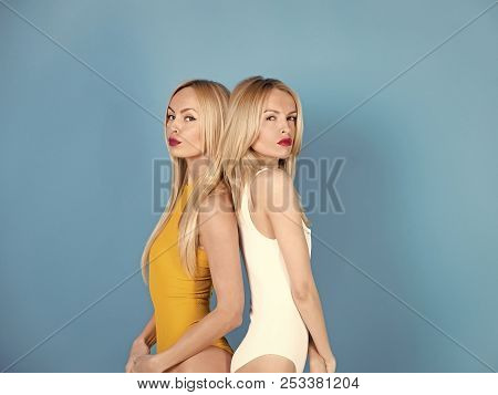Beauty, Fashion, Punchy Pastels, Relations. Twins Women In Sportswear, Hairdresser. Fitness And Diet