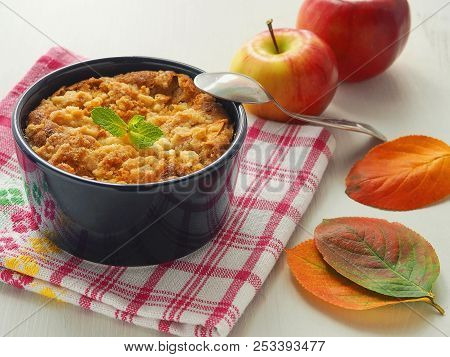 Portion Of Coffeecake In Blue Mug. Biscuit With Autumn Apples. Homemade Crumble Pie With Streusel To