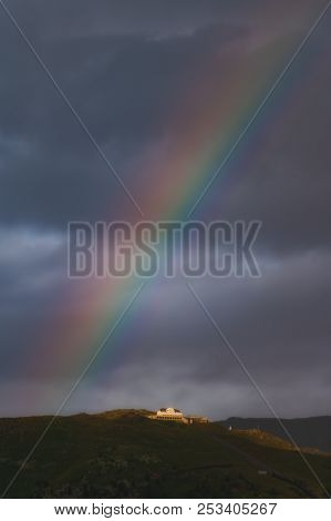 Rainbow After The Summer Storm At The Muottas Muragl Near St. Moritz In The Engadine Valley On The S