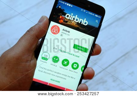 Bandar Seri Begawan,brunei - July 25th,2018 : A Male Hand Holding Smartphone With Airbnb App On An A