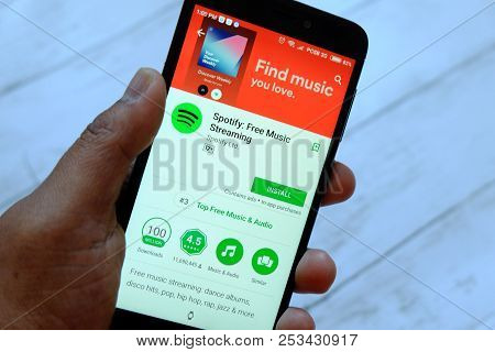 Bandar Seri Begawan,brunei - July 25th,2018 : A Male Hand Holding Smartphone With Spotify App On An 