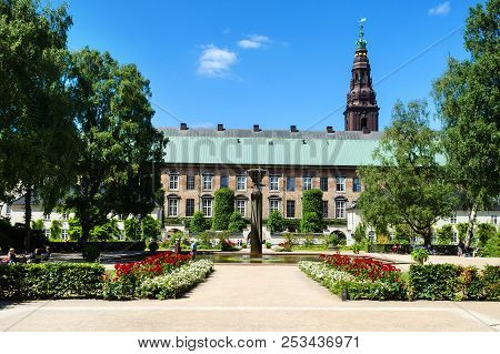 Copenhagen, Denmark - July 9, 2018. Beautiful Garden With A Fountain Of The Royal Library Of Copenha