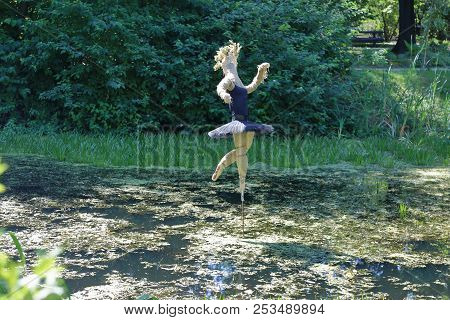 Ballerina Made Of Cloth Over The Water
