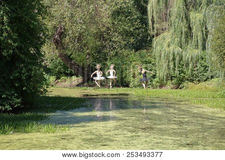 Ballerina Made Of Cloth Over The Water