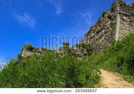 Ancient Ruins Of The Castle Of The Town Of Khust (dracula Castle). A Huge And Powerful Castle That P