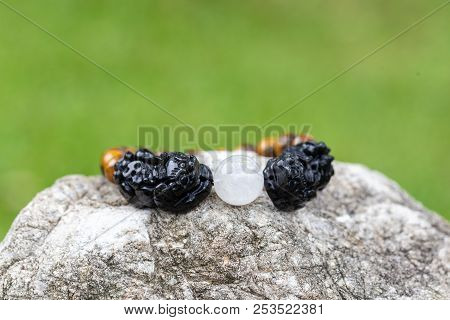 Tiger Eyes Stone And Pixiu Bracelet On The Stone