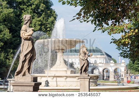 Sandstone Statues And Fountain In The Saxon Garden, Warsaw, Poland. Made Before 1745 By Anonymous Wa